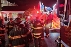 Volunteers seen here repacking the engine after fire extinguishment